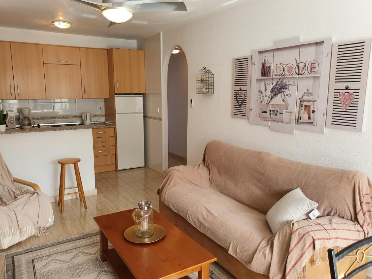 Apartment In Campoamor Overlooking The Swimming Pool Exterior photo